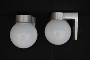 Sexy and rare pair of 1960's outdoor sconces