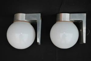 Sexy and rare pair of 1960's outdoor sconces