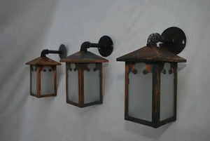 Set of three turn of the century copper outdoor sconces