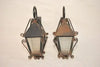 Elegant pair of 1940's French wrought iron outdoor sconces