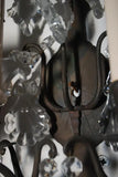 Elegant pair of Italian 1920's bronze/crystals sconces