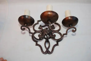 Elegant pair of French 1920's wrought iron sconces