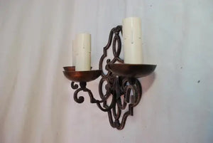 Elegant pair of French 1920's wrought iron sconces