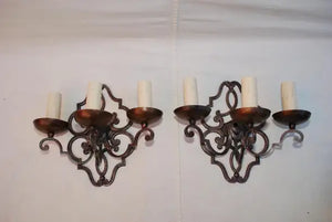 Elegant pair of French 1920's wrought iron sconces