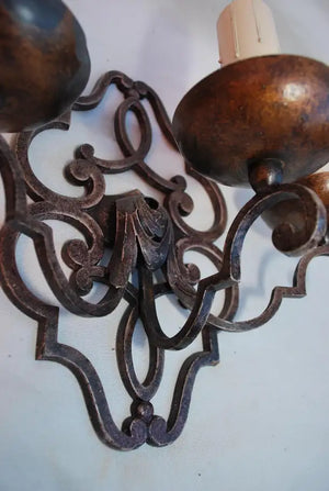 Elegant pair of French 1920's wrought iron sconces