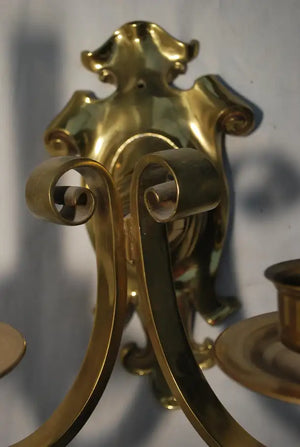 Elegant pair of brass sconces, English style