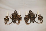 Large and elegant pair of 1920's brass sconces