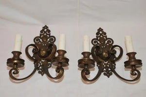 Large and elegant pair of 1920's brass sconces