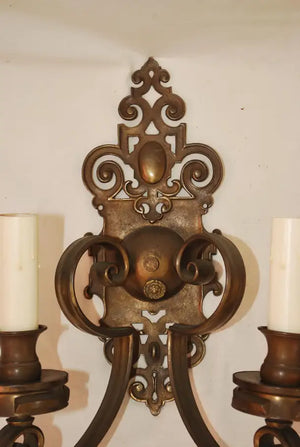 Large and elegant pair of 1920's brass sconces