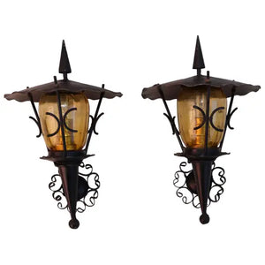 Rare pair of small French wrought iron outdoor/indoor sconces