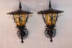 Rare pair of small French wrought iron outdoor/indoor sconces