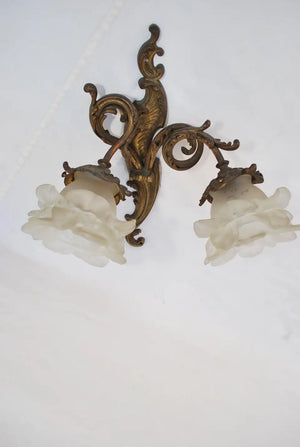 Beautiful pair of French turn of the century bronze sconces Louis XV style