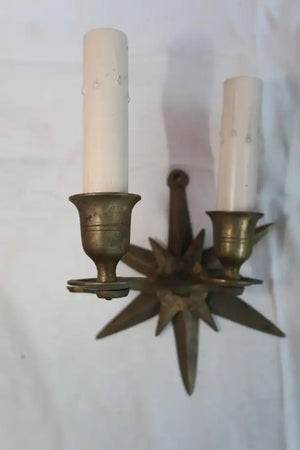 Rare pair of French 1940's star brass sconces