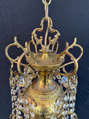 Elegant brass and crystal chandelier