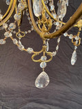 Elegant brass and crystal chandelier
