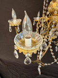 Elegant brass and crystal chandelier