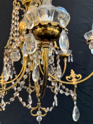 Elegant brass and crystal chandelier