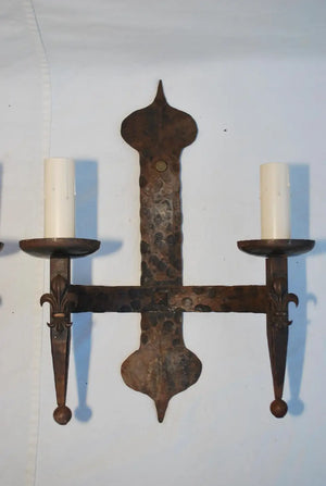 Elegant pair of 1930's wrought iron sconces