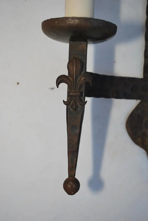 Elegant pair of 1930's wrought iron sconces