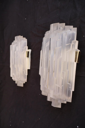 Beautiful and rare pair of 1970's skyscraper sconces