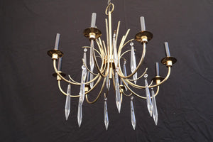 Elegant 1960's chandelier in the style of Tommi Parzinger
