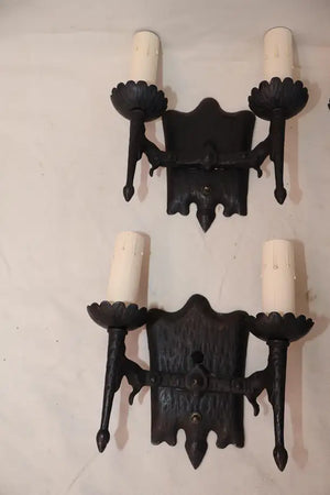 Rare set of ten 1920's cast iron sconces ( PRICE IS FOR ONE PAIR )