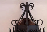 Pair of wrought iron sconces with hands blown glass