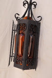Pair of wrought iron sconces with hands blown glass