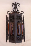 Pair of wrought iron sconces with hands blown glass