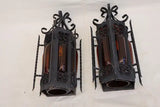 Pair of wrought iron sconces with hands blown glass