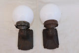 Pair of 1920' cast iron outdoor sconces