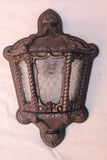 Rare pair of 1920's cast iron outdoor sconces