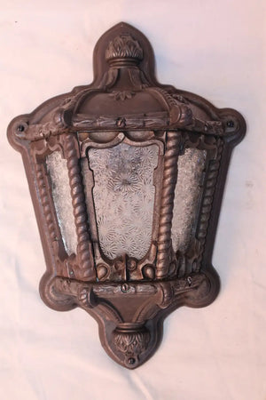 Rare pair of 1920's cast iron outdoor sconces
