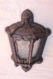 Rare pair of 1920's cast iron outdoor sconces