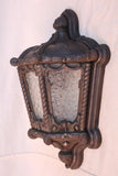 Rare pair of 1920's cast iron outdoor sconces