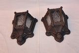 Rare pair of 1920's cast iron outdoor sconces