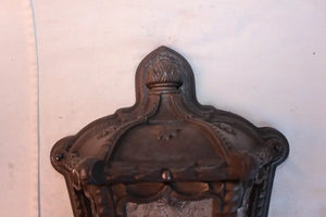 Rare pair of 1920's cast iron outdoor sconces
