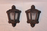 Rare pair of 1920's cast iron outdoor sconces