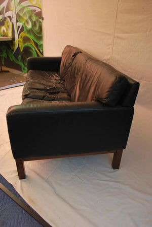 sexy leather sofa design by Erik Jorgensen