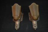 Elegant pair of 1920's silver plated sconces