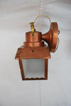 Cute pair of 1940's copper/brass outdoor sconces