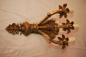 Elegant pair of French 1940''s Brass sconces with cupids