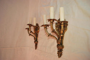 Elegant pair of French 1940''s Brass sconces with cupids