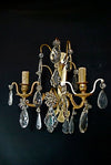 pair of French bronze/crystal sconces attributed to bagues