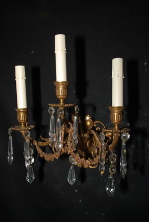 Beautiful and elegant pair of late 19 th Century French bronze sconces