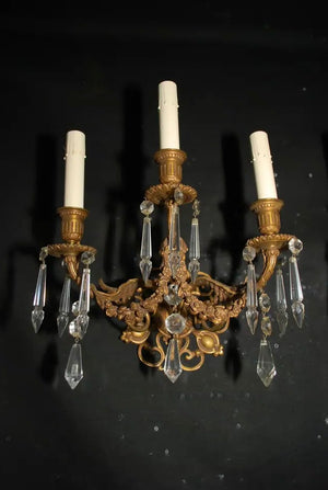 Beautiful and elegant pair of late 19 th Century French bronze sconces
