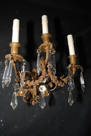 Beautiful and elegant pair of late 19 th Century French bronze sconces